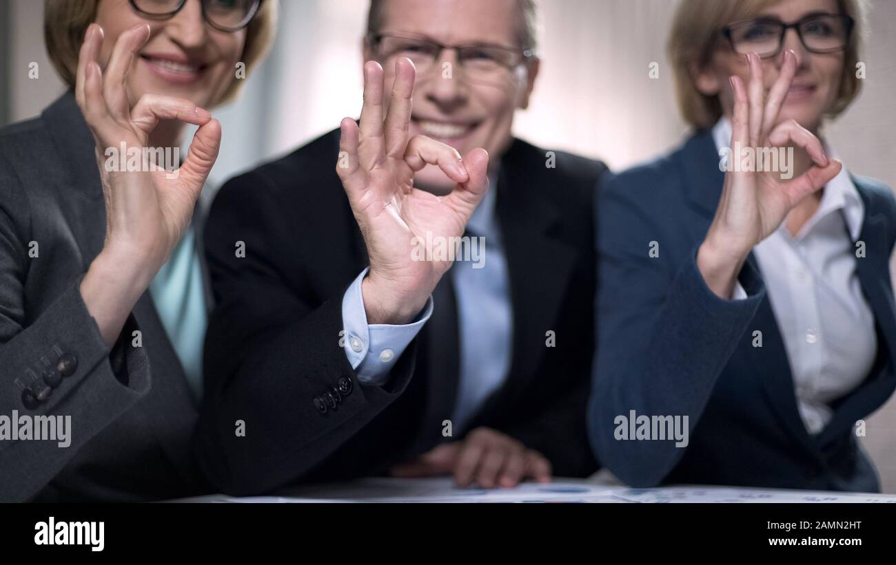 Group smiling people showing ok hi-res stock photography and images - Alamy