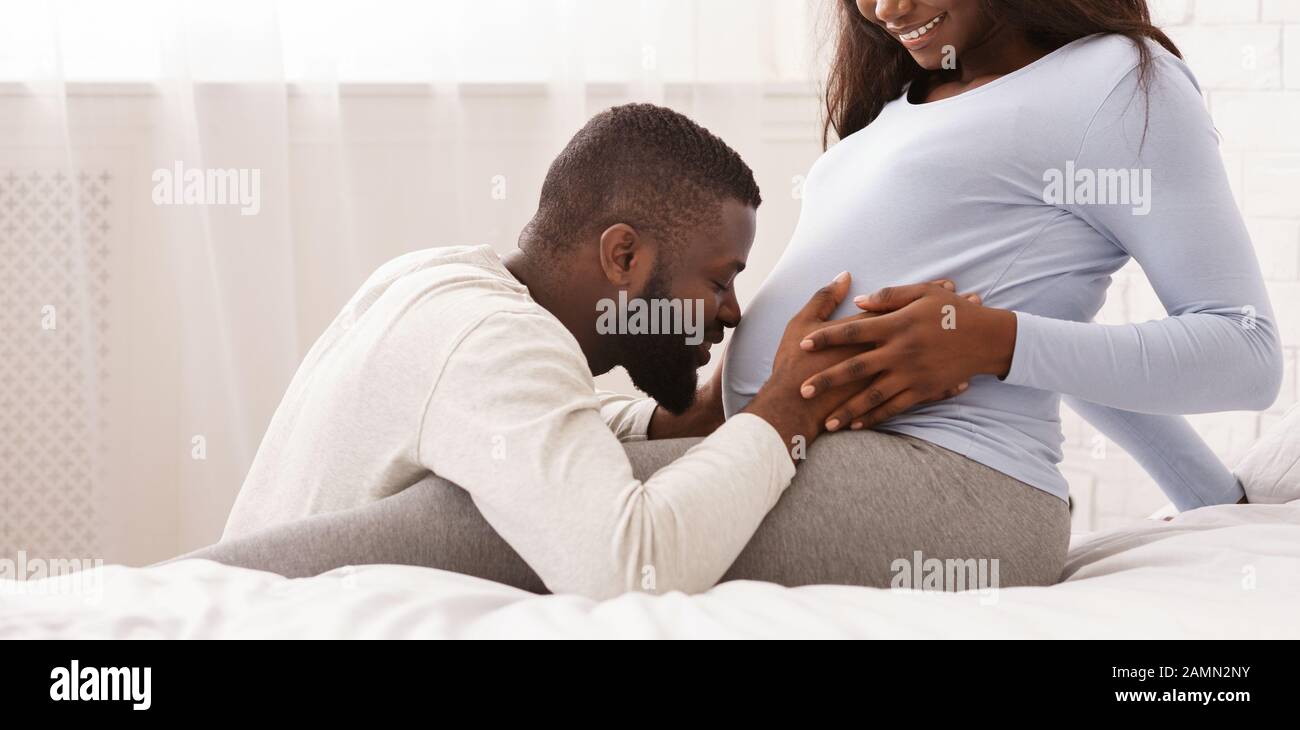 black guy picks up wife