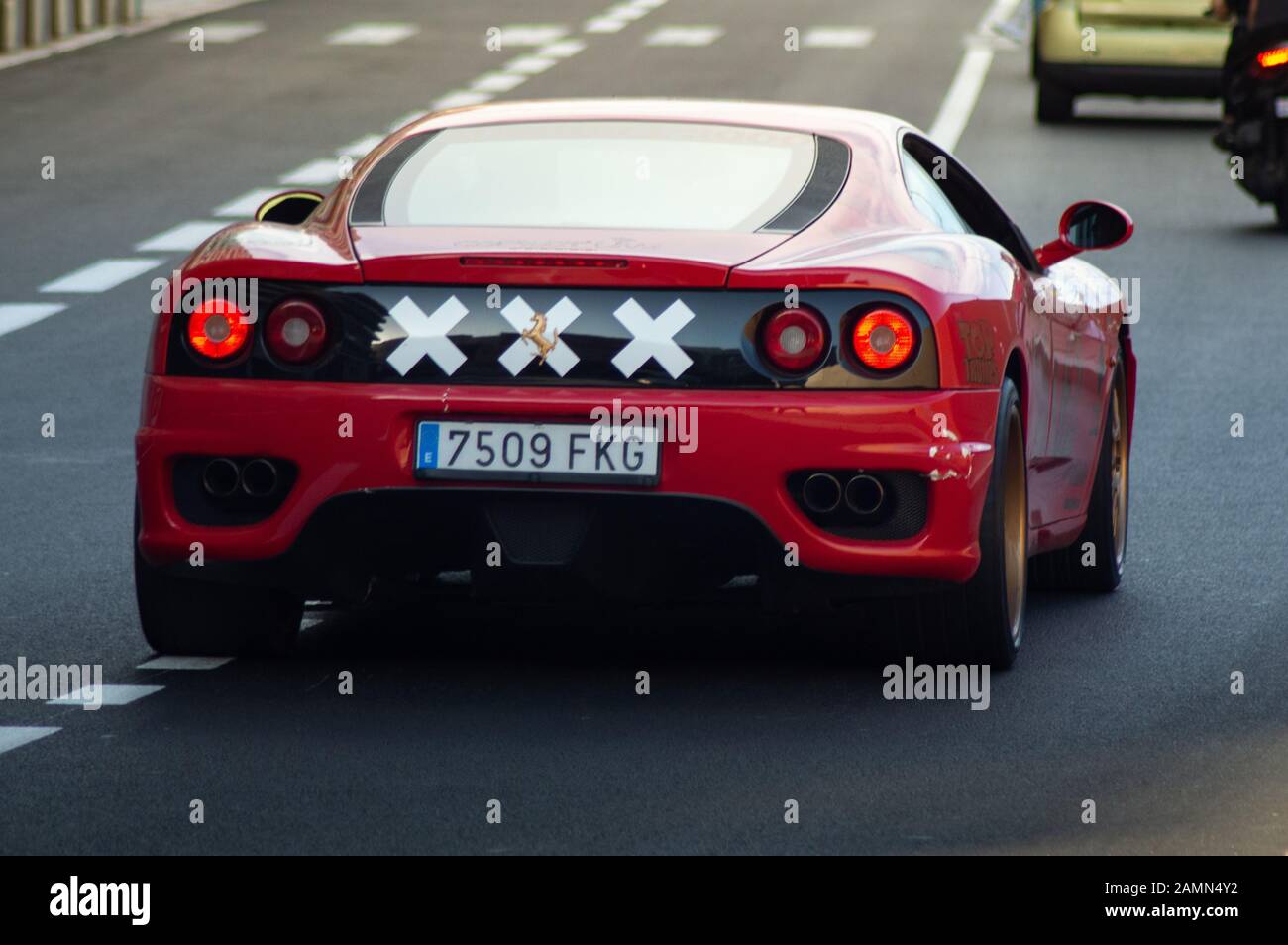 Red Ferrari 360 driving around in Monaco Stock Photo - Alamy