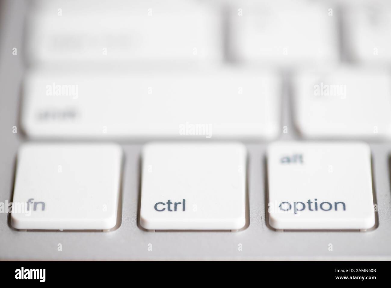 three buttons close up computer white keyboard and others blur keys,  function, control and option button, use for command action program Stock  Photo - Alamy