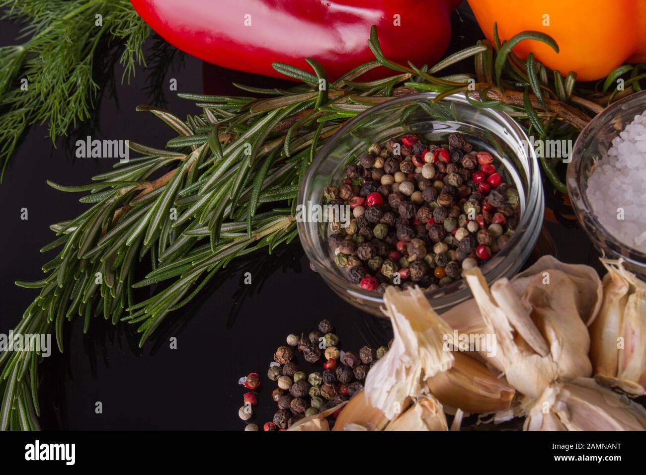 Rosemary and condiments close up. Stock Photo