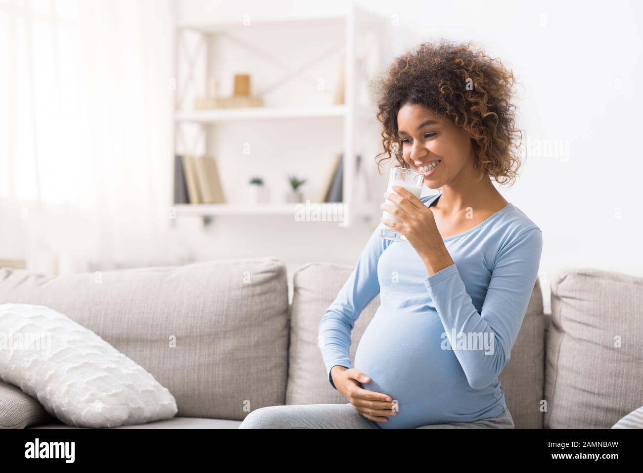 Dairy products at pregnancy. Woman drinking natural milk Stock Photo Alamy