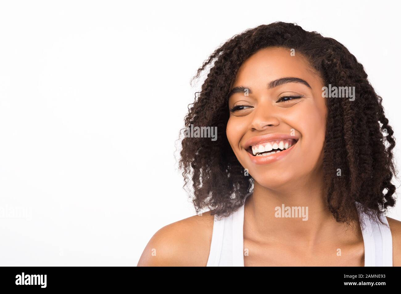 Close up portrait of laughing afro woman Stock Photo
