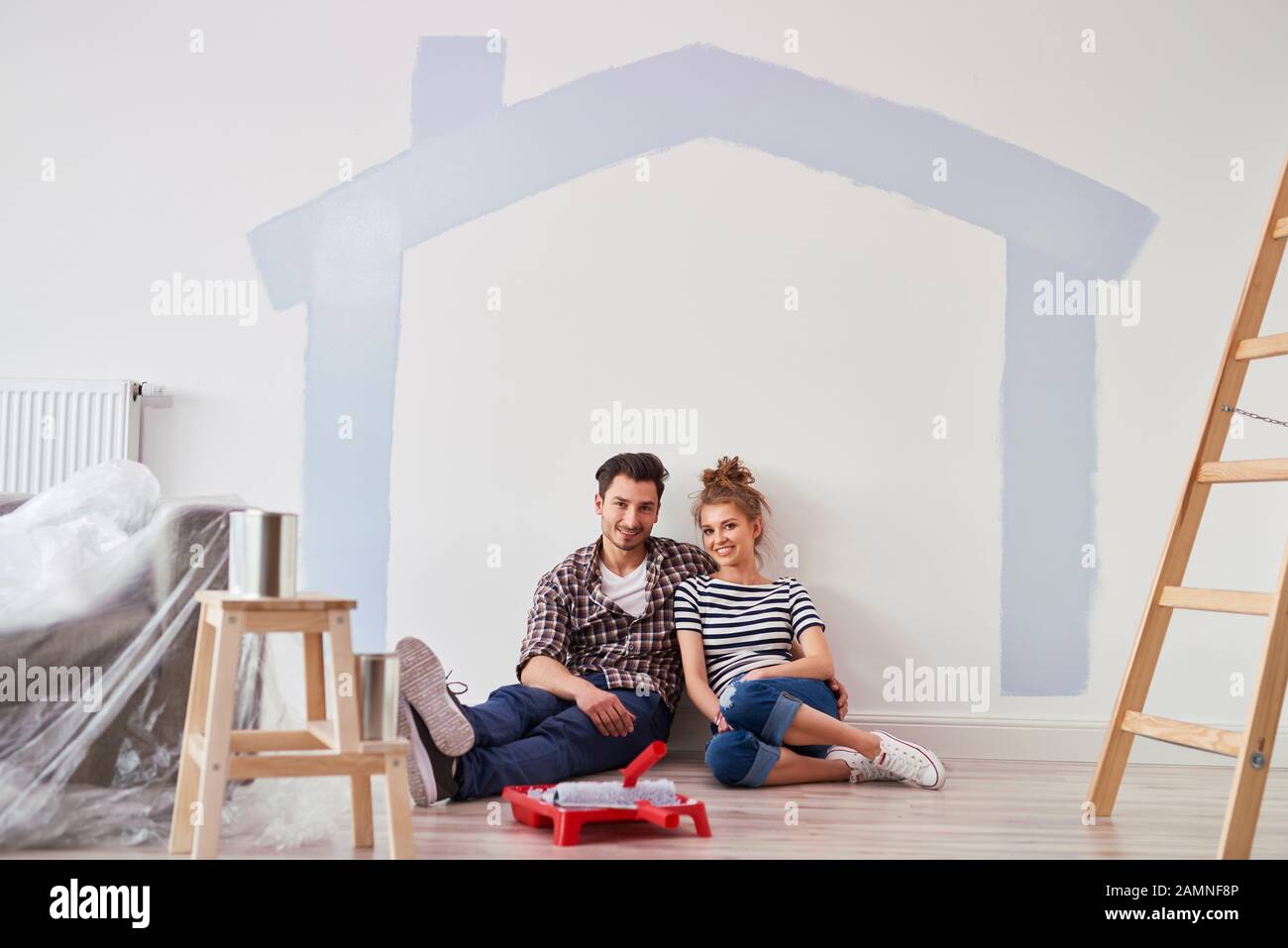 Portrait of couple in their new home Stock Photo