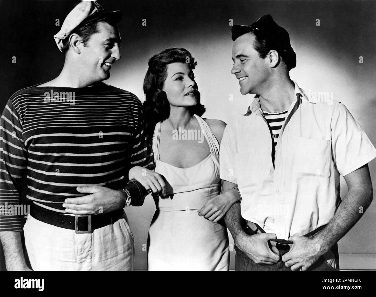 MITCHUM,HAYWORTH,LEMMON, FIRE DOWN BELOW, 1957 Stock Photo