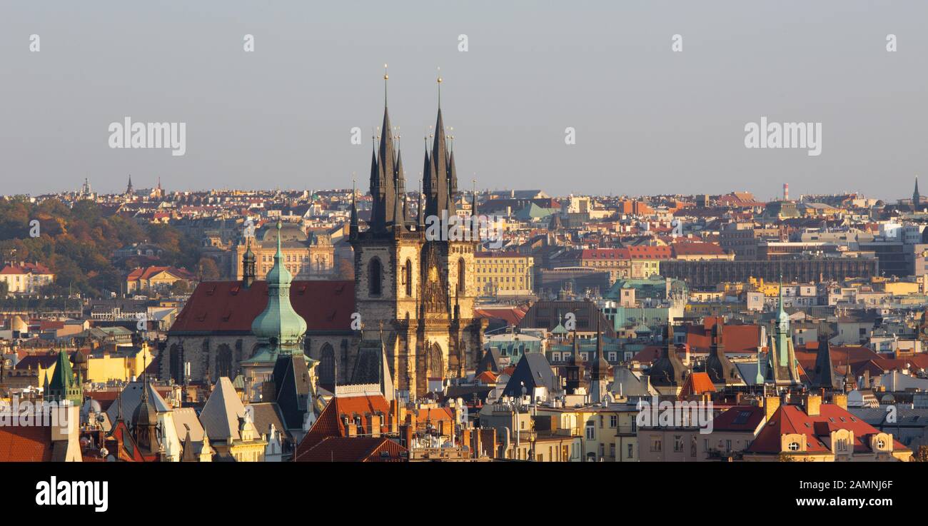 Prague - The panorama of Town and the church of Our Lady before Týn in the evening light. Stock Photo