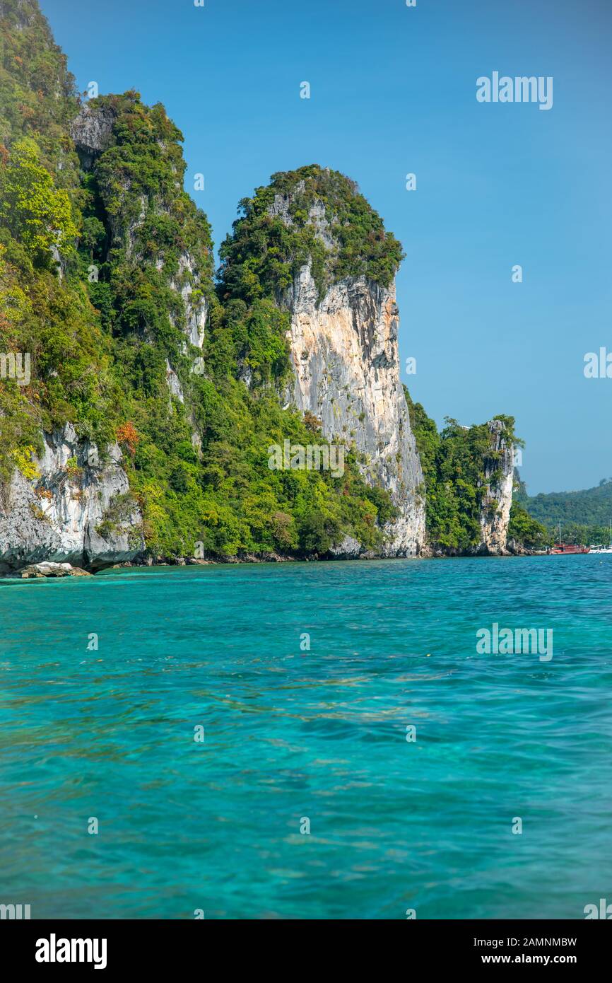 Amazing rocks along the famous Monkey Beach, Phi Phi Island, Thailand. Stock Photo