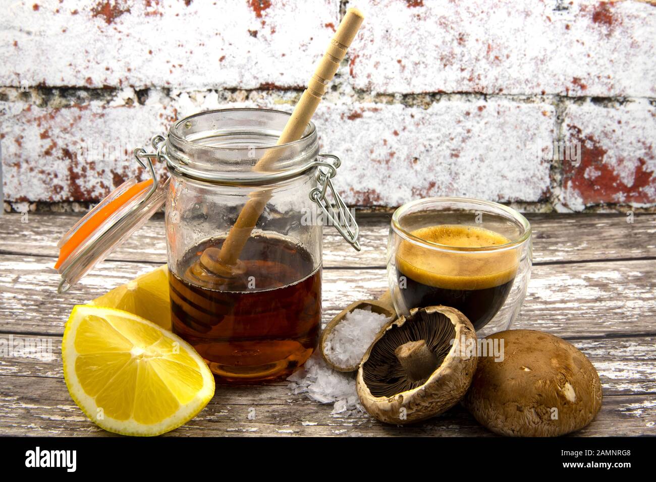 Rustic still life of the five tastes distinguishable on the human tongue - sour, sweet, salt, bitter and umami (savoury) Stock Photo