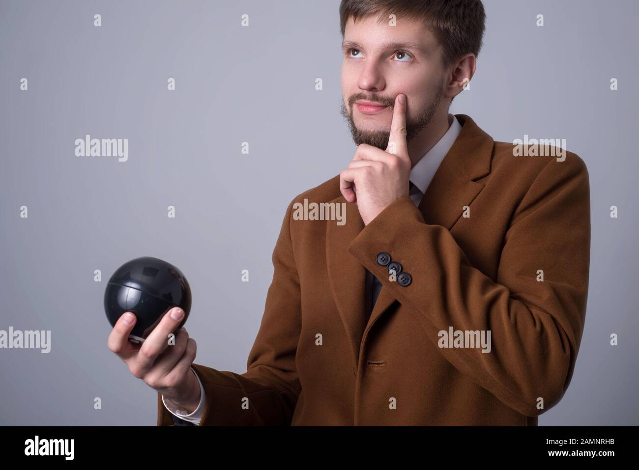 Teenager holding her hand at chin hires stock photography and images