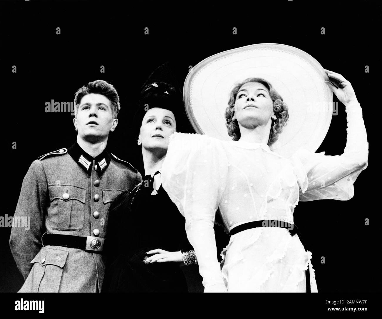 Gary Oldman (as A Soldier), Georgina Hale (as Clara Petacci) and Glenda Jackson (as Eva Braun) in SUMMIT CONFERENCE by Robert David MacDonald designed & directed by Philip Prowse at the Lyric Theatre, London W1 opening on 28/04/1982 Stock Photo