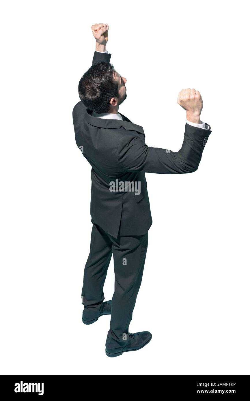 Cheerful winner businessman celebrating his success with fists raised ...