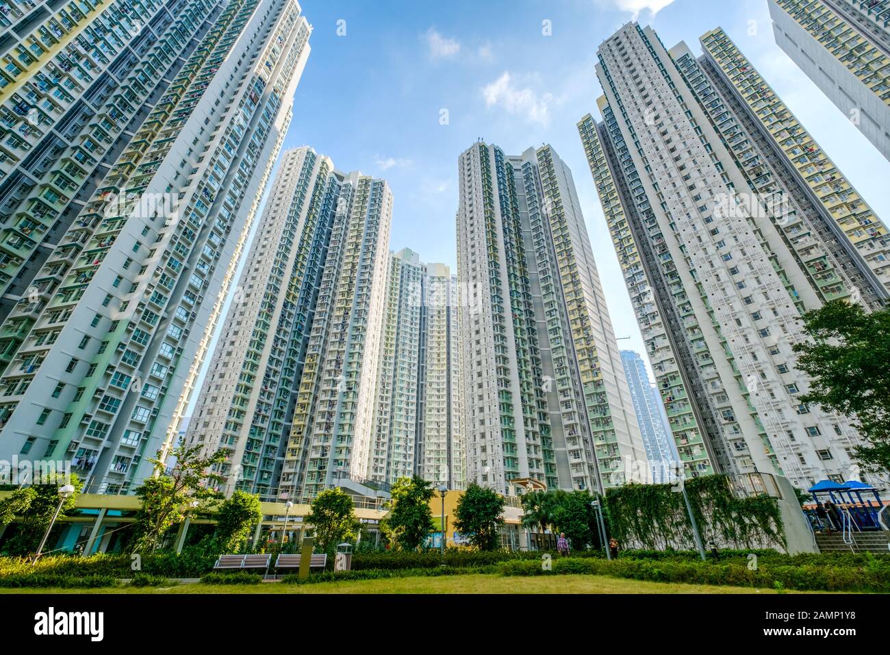 huge residential building complex, green court betweern high-rise apartment buildings - Stock Photo