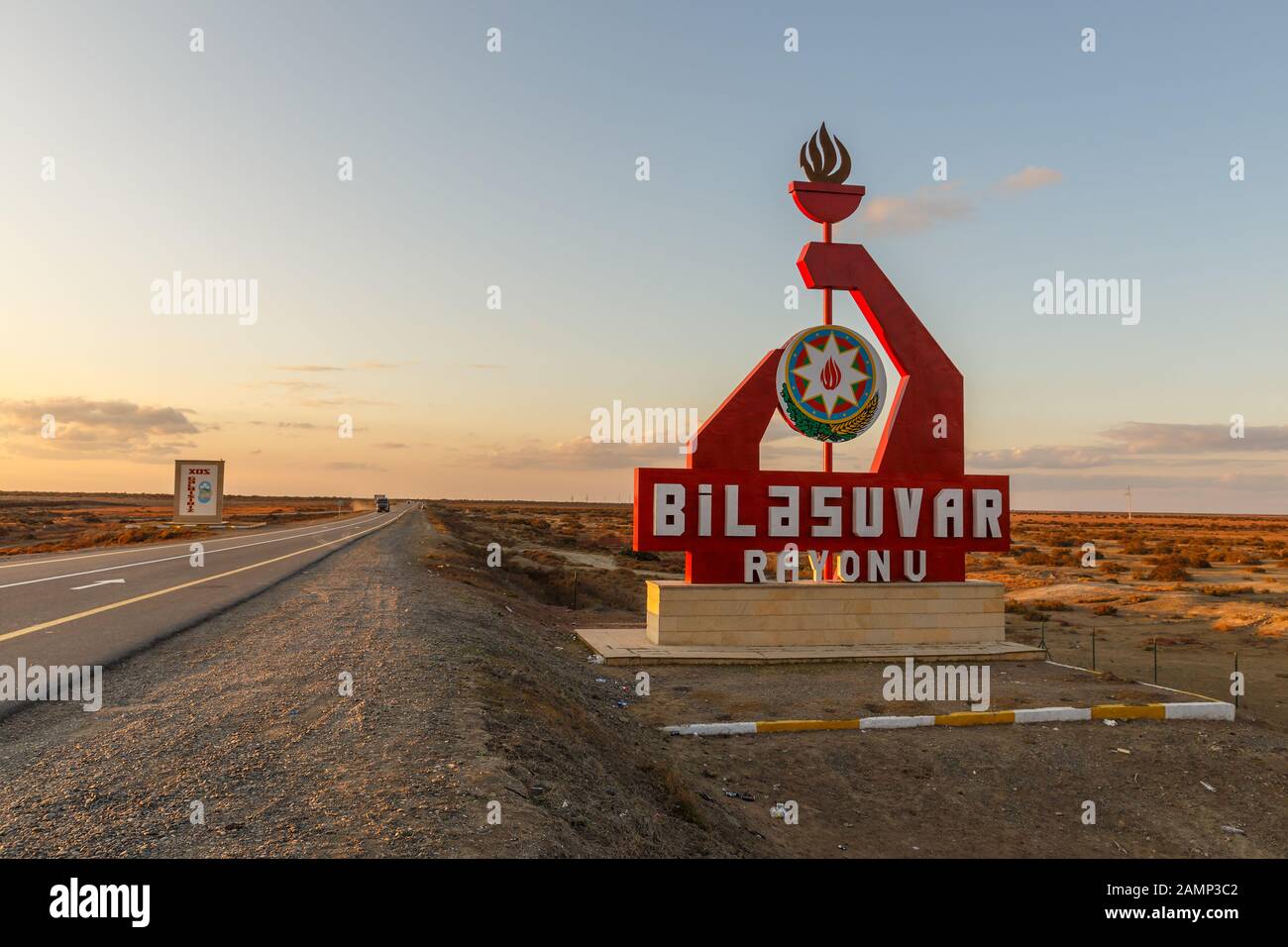 Bilasuvar, Azerbaijan - November 16, 2019: Entrance to the Bilasuvar District. Road sign at the entrance to Bilasuvar Rayon. Azerbaijan. Stock Photo