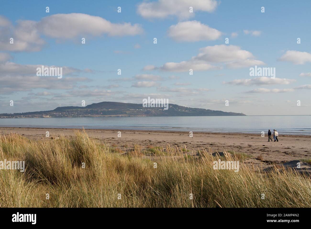 Dollymount Strand in Dublin Ireland. Howth Head can be seen in the distance. Stock Photo