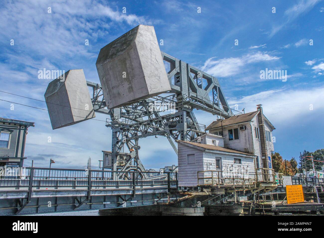 Mystic USA 2011-08-08 015 Iconic Mystic River Bascule Drawbridge with all its mechanical parts are exposed against a beautiful blue sky with clouds Stock Photo