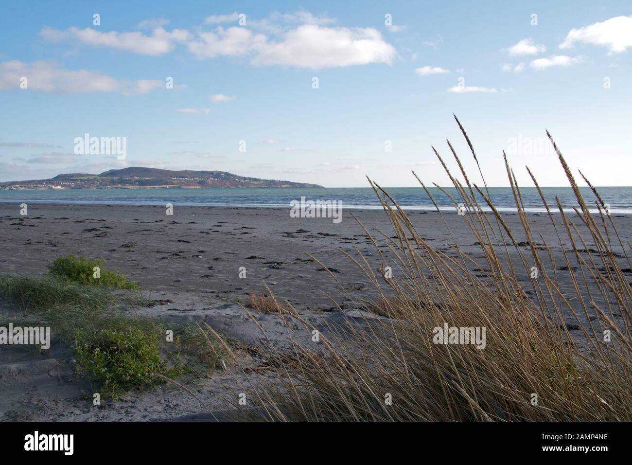 Dollymount Strand in Dublin Ireland. Howth Head can be seen in the distance. Stock Photo