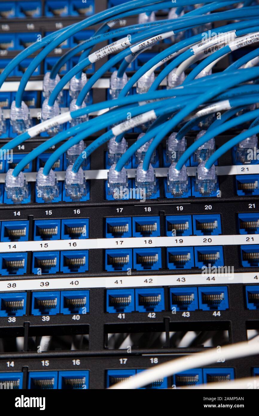 Close up shot of router cables in a data centre cabinet. Stock Photo