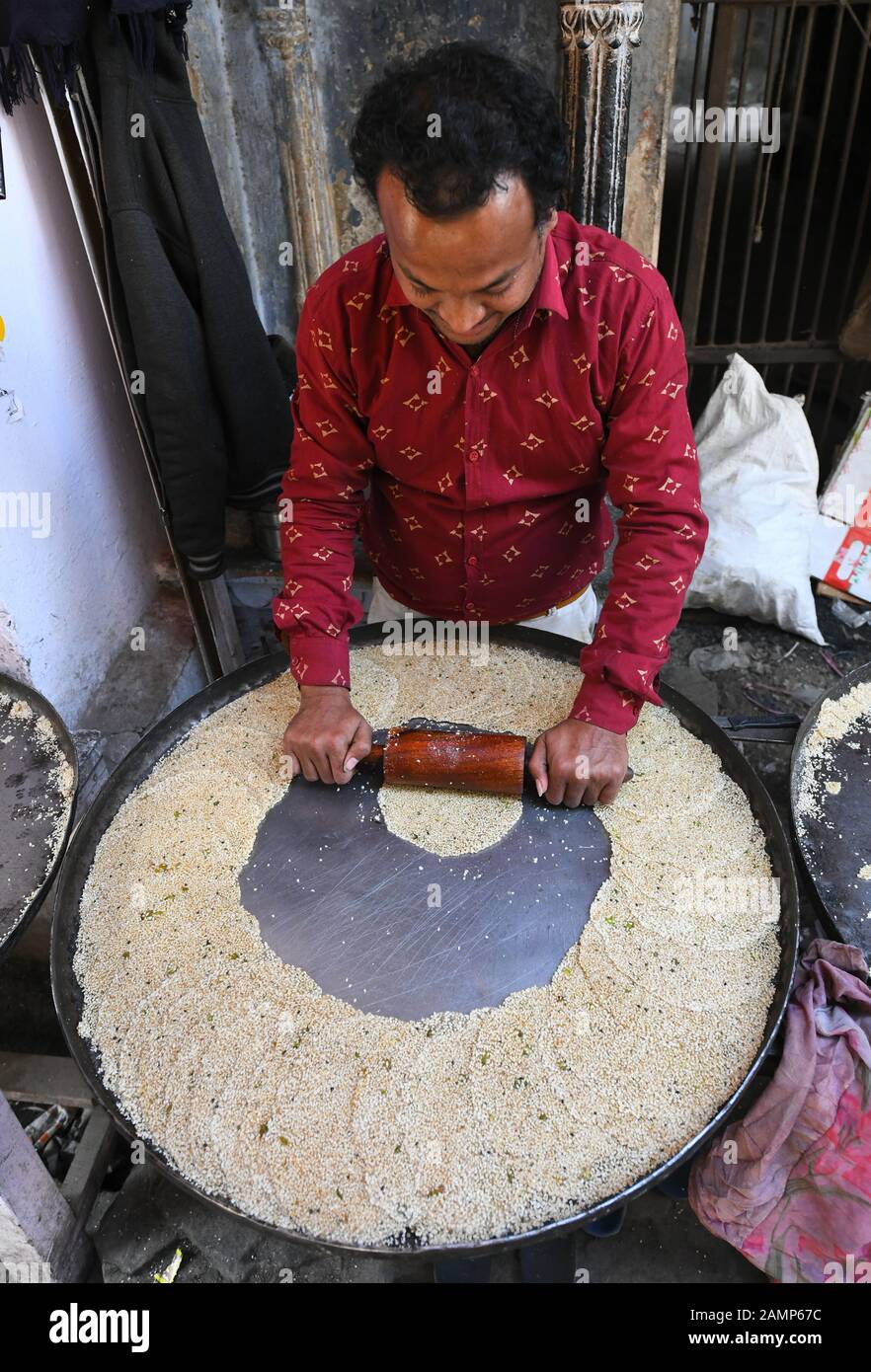Beawar India 14th Jan 2020 Sweet seller making Til Patti at a shop in  Beawar Til Patti is a world famous sweet made with roasted sesame dry  fruits ghee and jaggery This