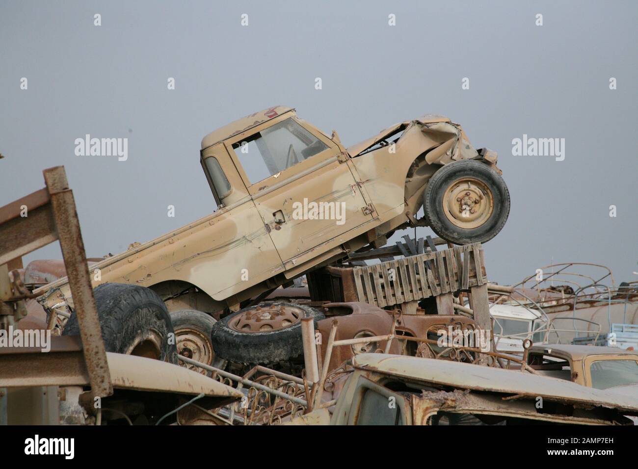 Land rovers on a scrap yard in the middle east Stock Photo