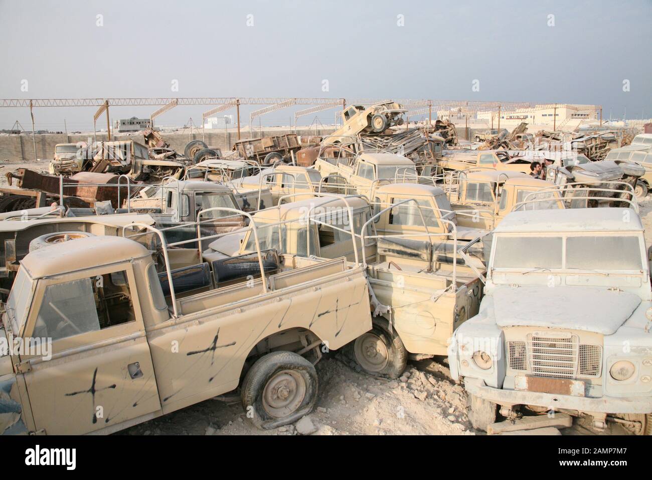 Land rovers on a scrap yard in the middle east Stock Photo