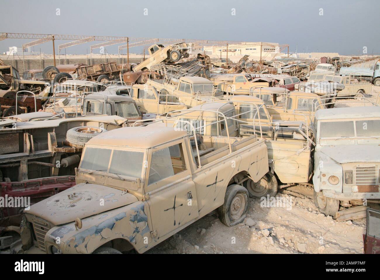 Land rovers on a scrap yard in the middle east Stock Photo - Alamy