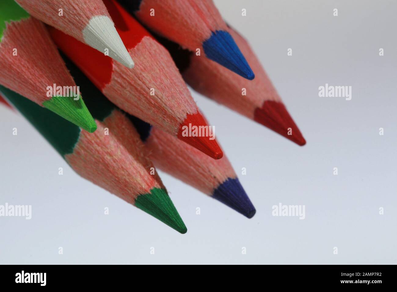 Close-up shot of a bunch of coloured pencils. Stock Photo
