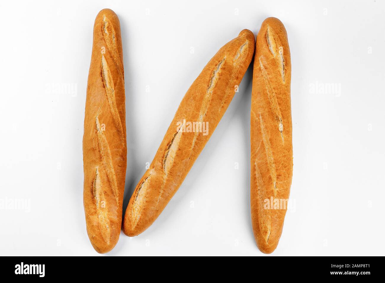French baguette, bread. Isolated on white background Stock Photo - Alamy