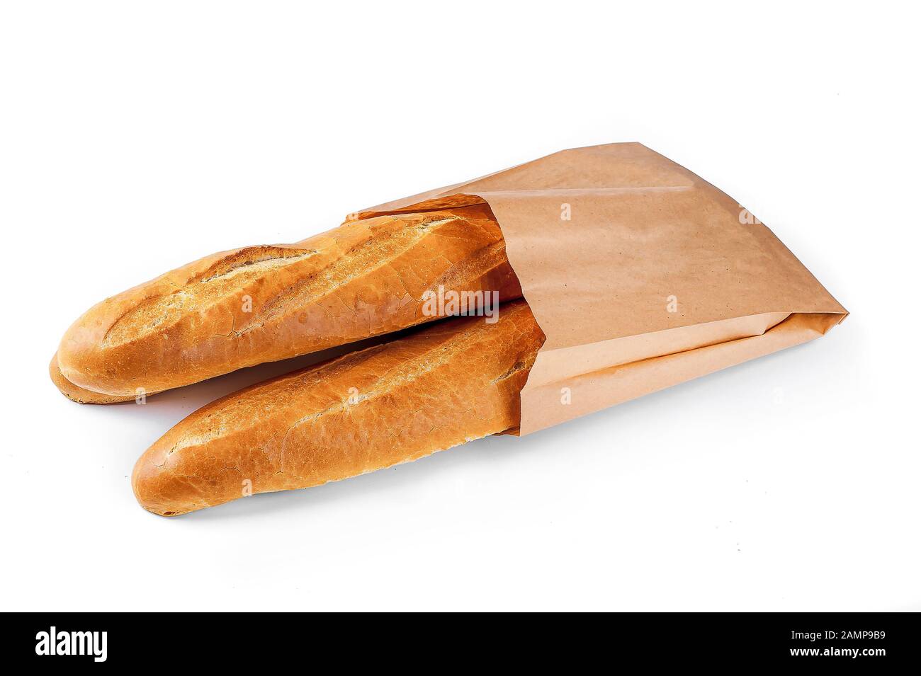 Baguette bread in paper bag on white background Stock Photo - Alamy