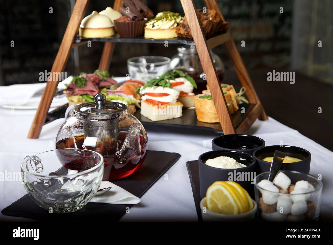 Afternoon tea table setting. Stock Photo