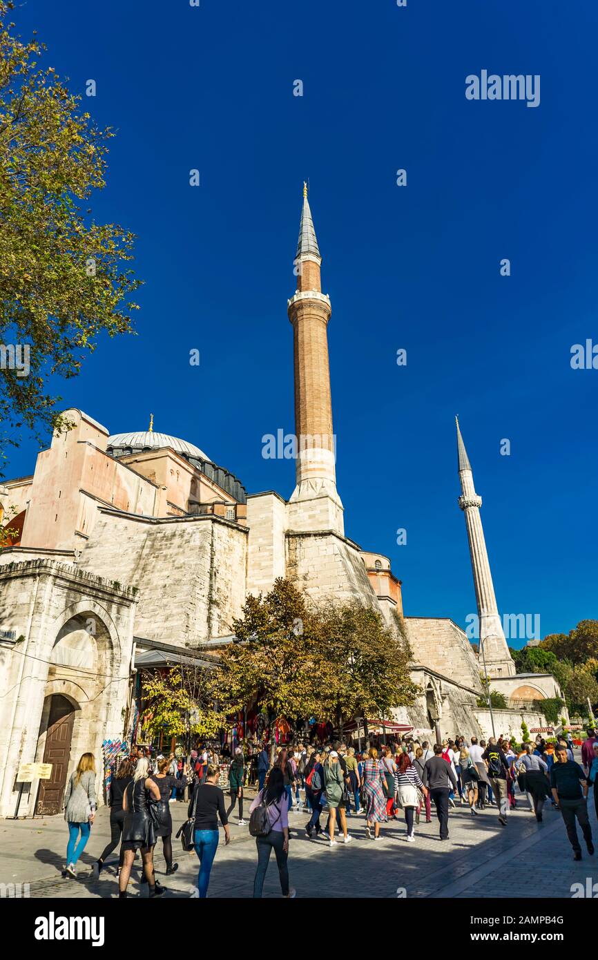 ISTANBUL, TURKEY - NOVEMBER 10, 2019: Unidentified people by Hagia Sophia in Istanbul, Turkey. It is the former Greek Orthodox Christian patriarchal c Stock Photo