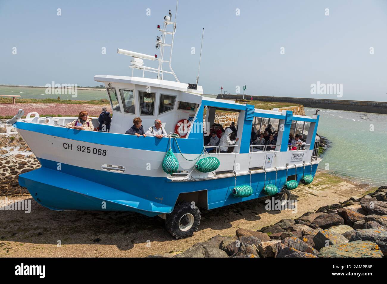 Amphibious vehicle leaving Saint-Vaast-la-Hougue taking tourists to Tatihou Island, Manche, Normandy, France Stock Photo