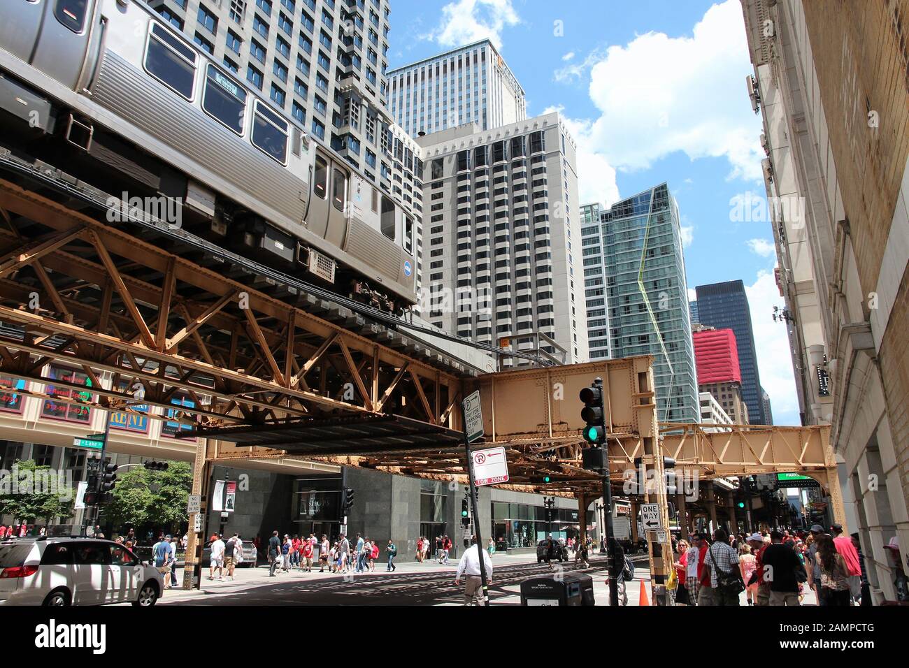 CHICAGO, USA - JUNE 28, 2013: People visit downtown in Chicago. Chicago is the 3rd most populous US city with 2.7 million residents (8.7 million in it Stock Photo