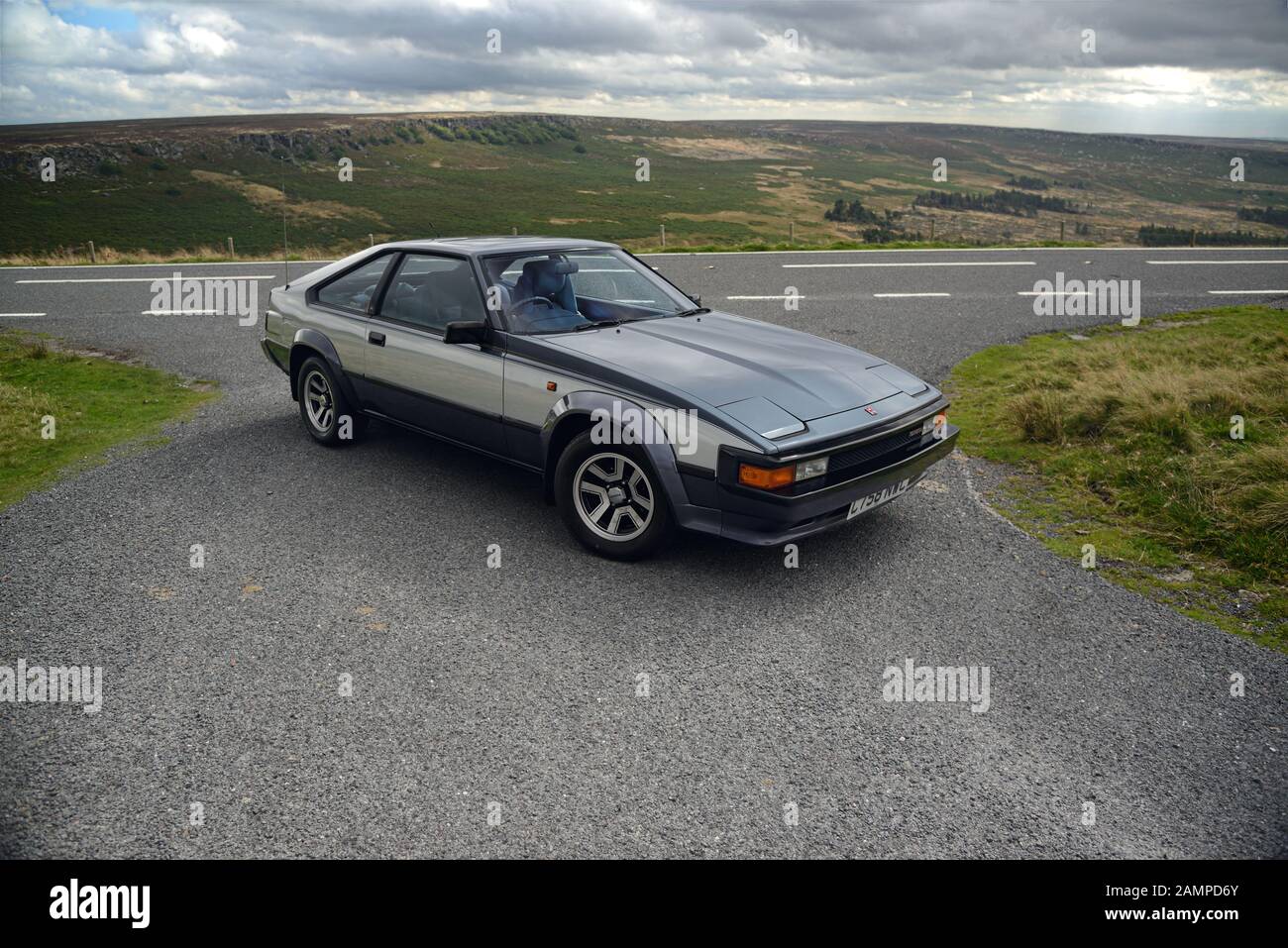 1985 Toyota Celica Supra 2.8i parked on a country road in the Derbyshire Peak Disctrict Stock Photo
