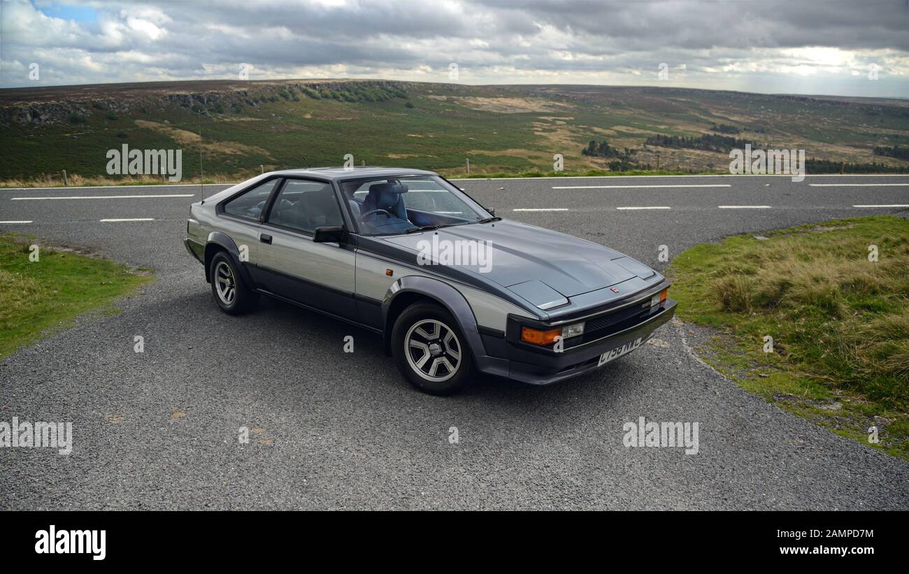1985 Toyota Celica Supra 2.8i parked on a country road in the Derbyshire Peak Disctrict Stock Photo