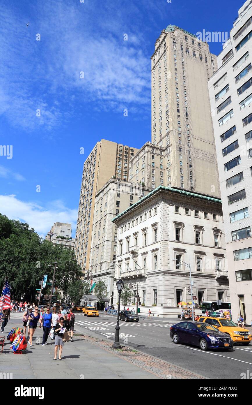 NEW YORK, USA JULY 2, 2013 People walk at intersection of 5th Avenue and E 60th Street in New