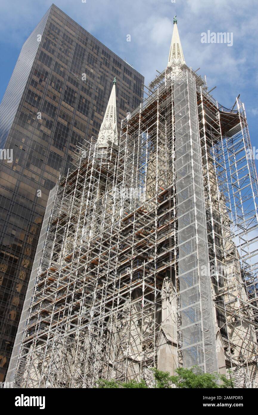 New York renovation - scaffoldings covering St. Patrick's Cathedral. Monument reconstruction works. Stock Photo