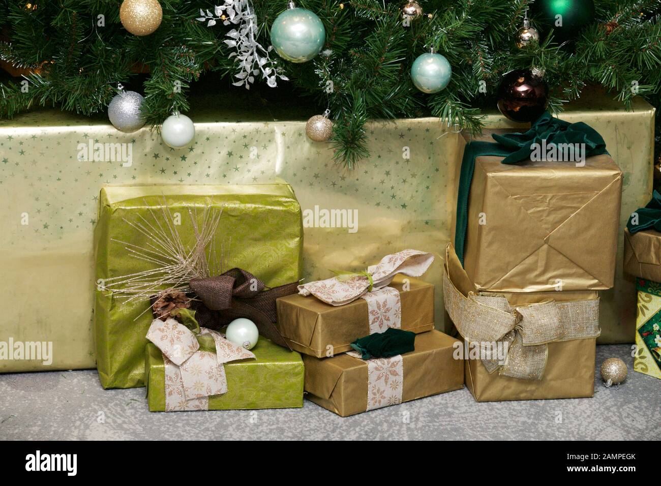 Christmas gifts under a Christmas tree. Stock Photo