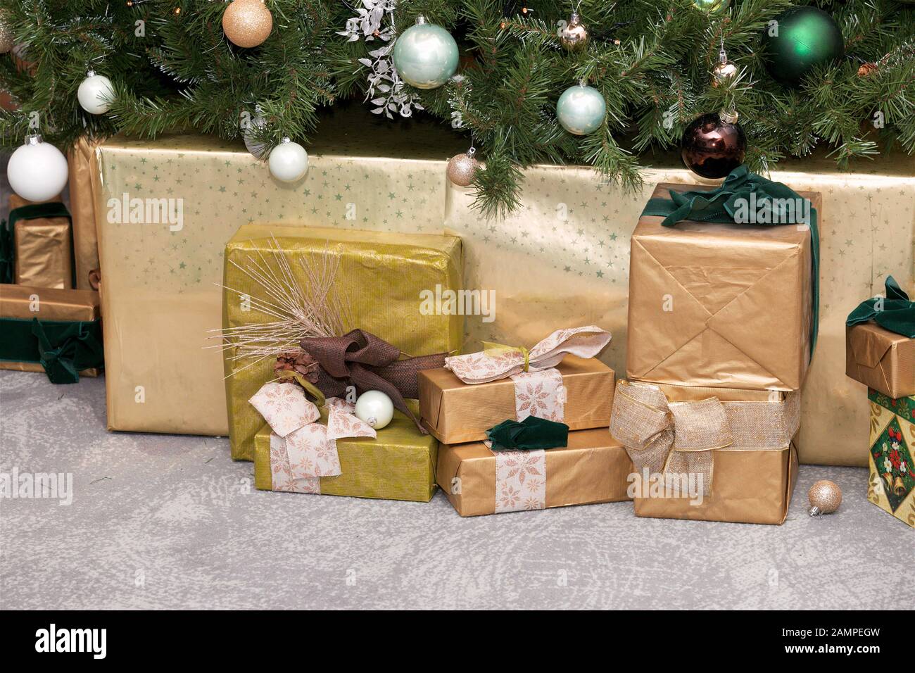 Christmas gifts under a Christmas tree. Stock Photo