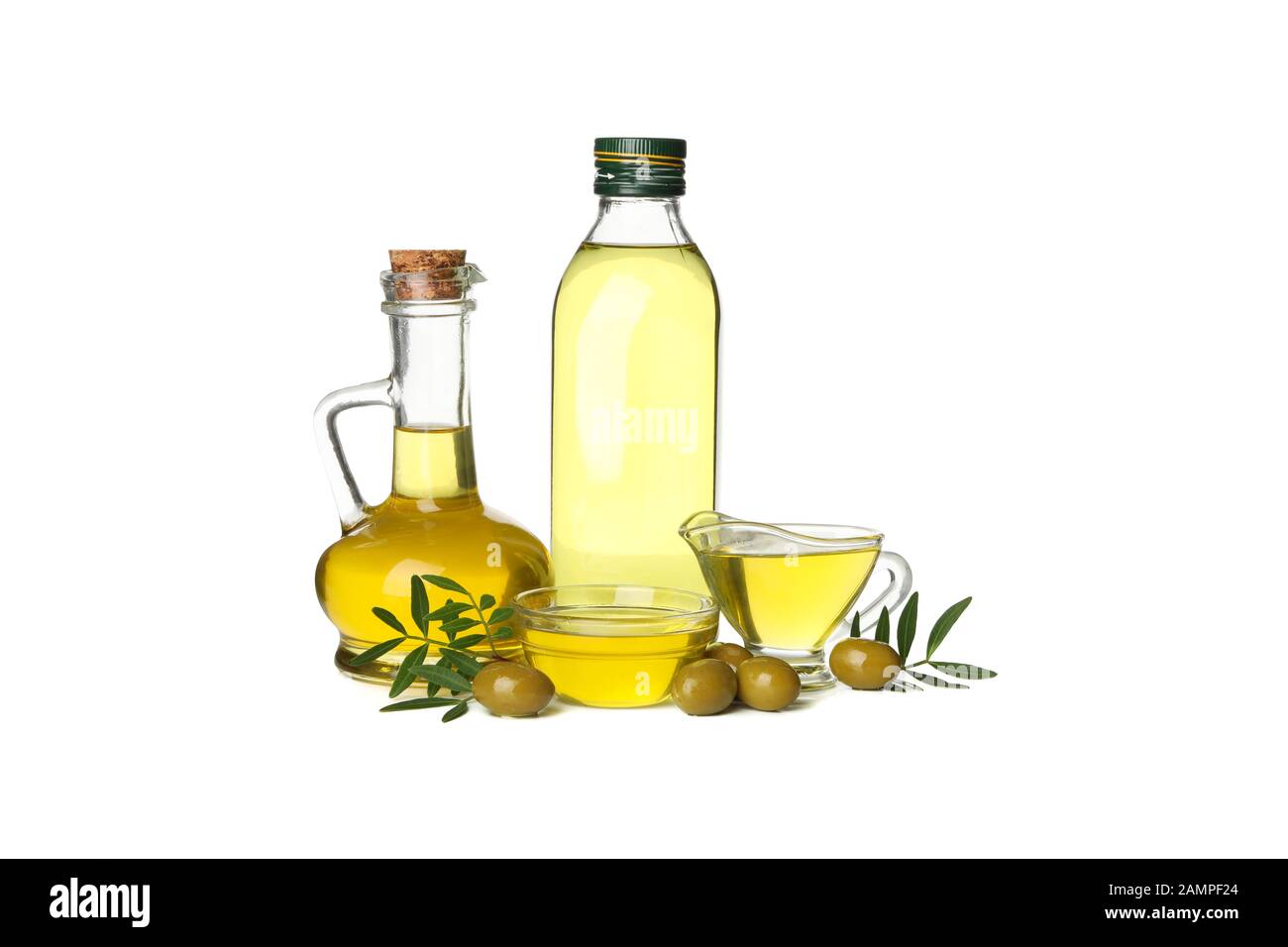 Glass bottle, jug and bowls with olive oil isolated on white background ...
