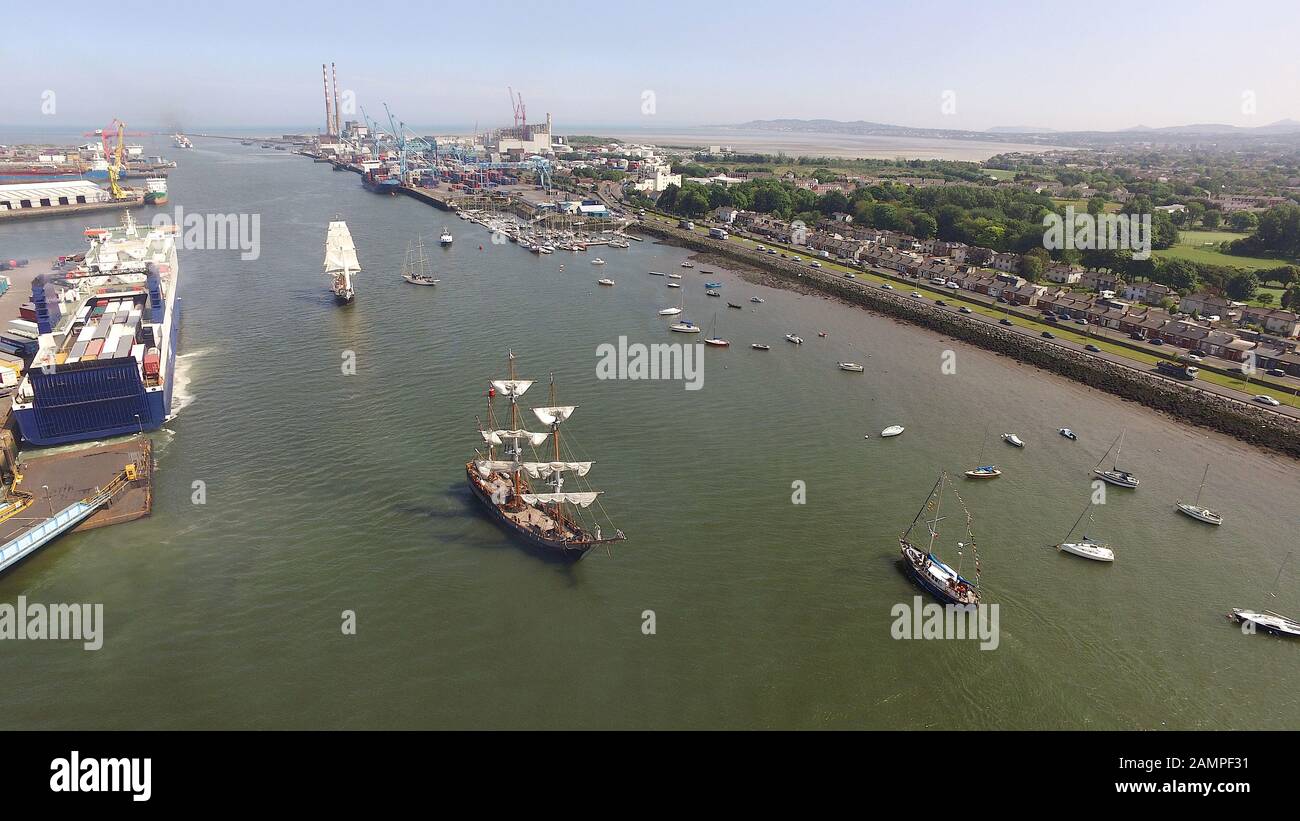 Drone aerial view of tall ships sailing through Dublin Port, Ireland. Stock Photo