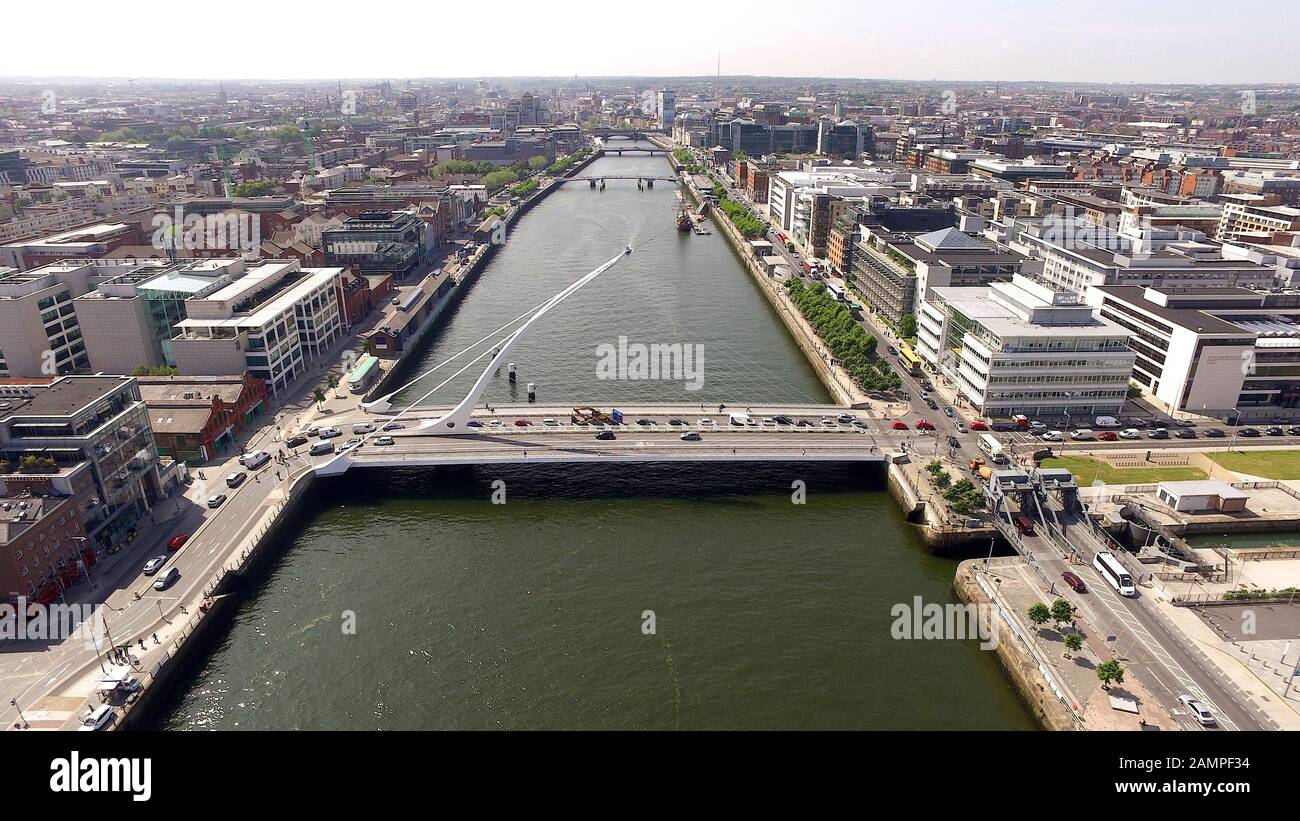 Aerial drone view of the Samuel Beckett Bridge and the river Liffey in ...