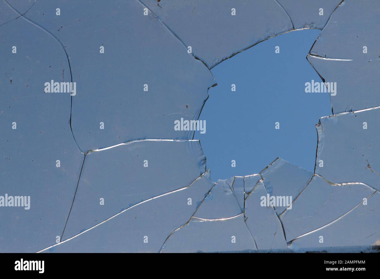 Dirty cracked glass background texture. Stock Photo