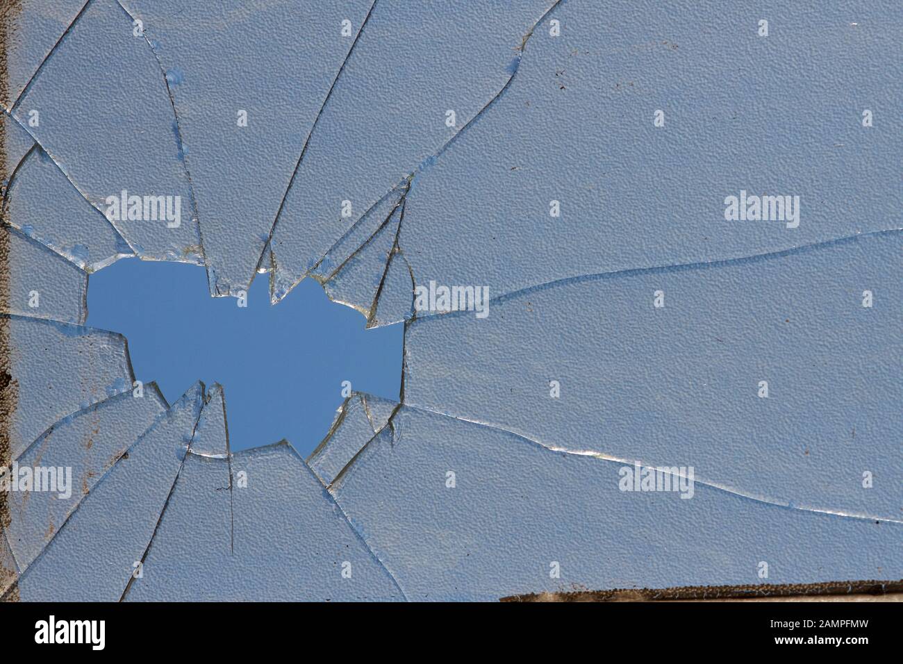 Dirty cracked glass background texture. Stock Photo