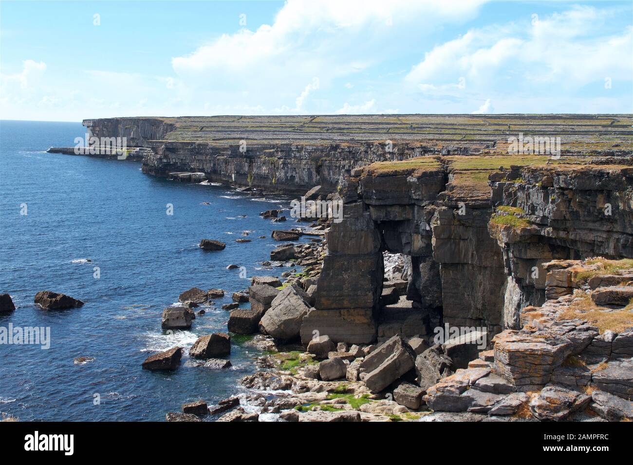 Rugged cliffs at Inishmore, the largest of the Aran Islands, off the west coast of Galway, Ireland. Stock Photo
