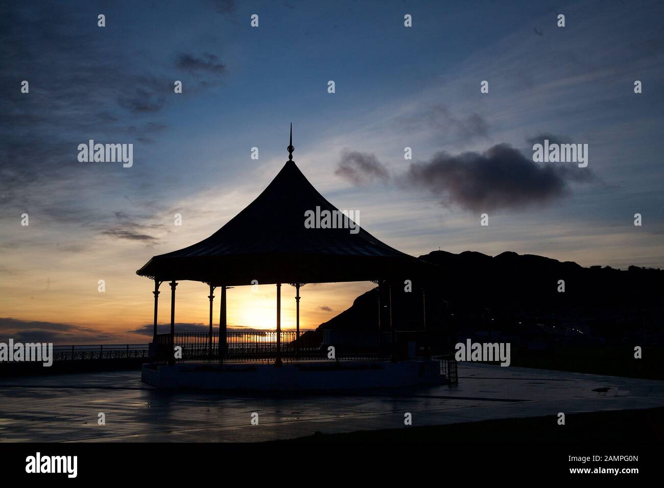 Silhouette of a gazebo on the waterfront in Bray, County Wicklow, Ireland at sunset. Stock Photo