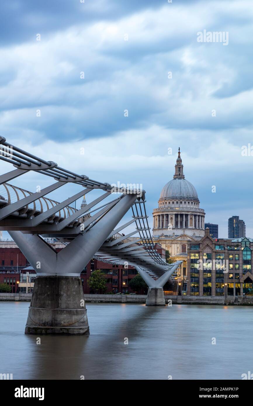 Millennium Bridge over River Thames with dome of St. Paul's Cathedral beyond, London, England, UK Stock Photo