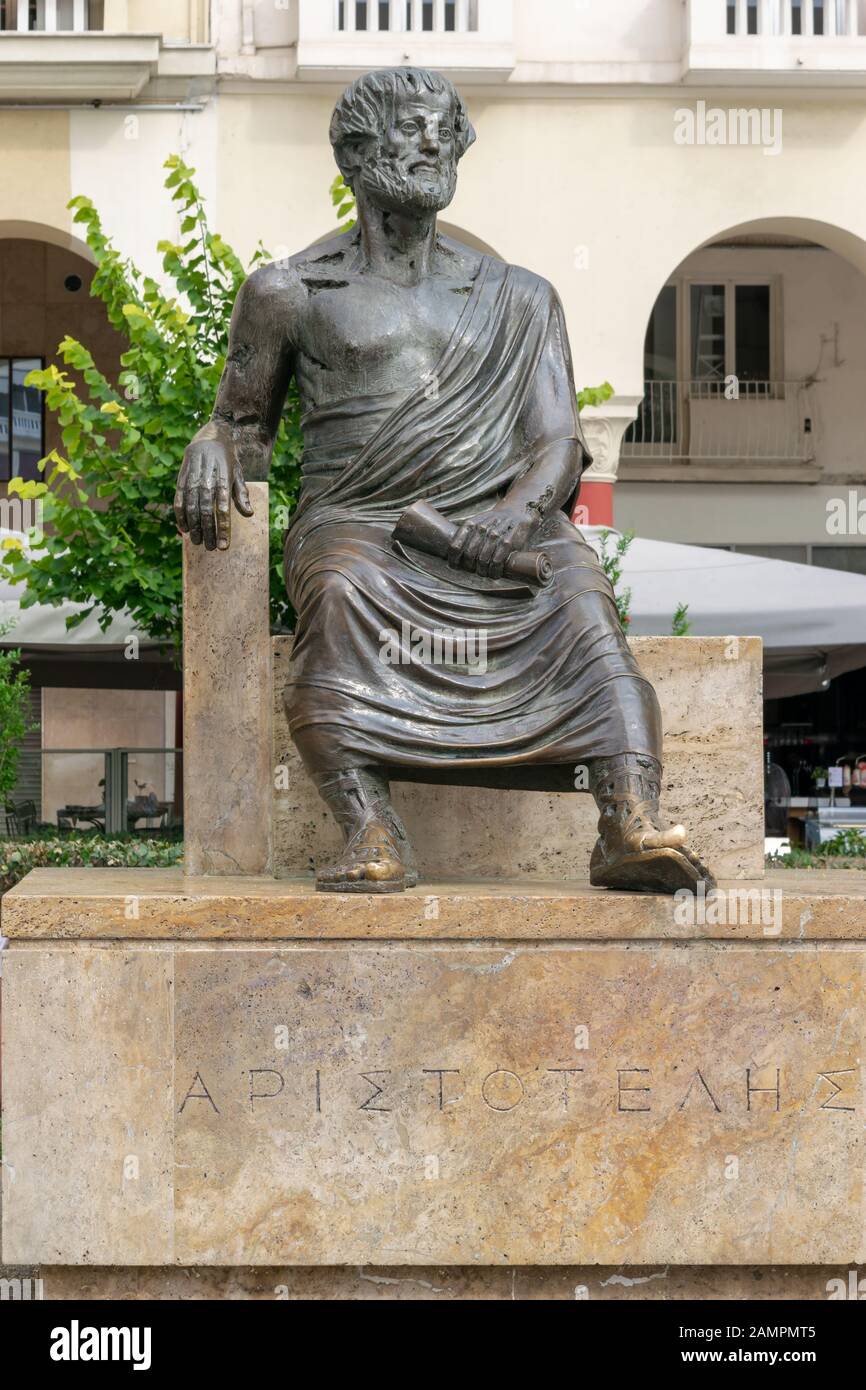 The sculpture of the ancient Greek philosopher Aristotle in the historic center of the city on the Aristotelous Square Stock Photo