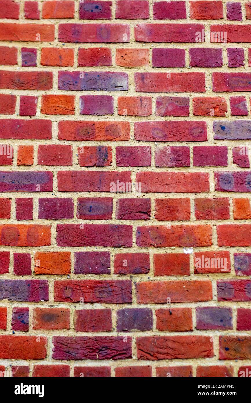 Colorful brick wall as a textured wallpaper or background Stock Photo -  Alamy