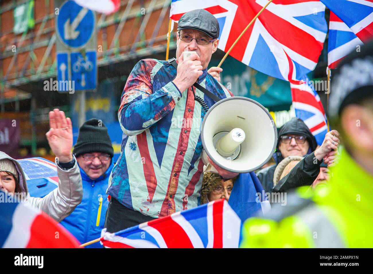 Glasgow, UK. 11th Jan, 2020. Pro-Unionist group leader Alistair McConnachie is seen shouting over his megaphone during the counter-protest.80,000 supporters came out in support of Scottish Independence following the UK General Election and the upcoming date of January 31st when the UK will leave the European Union, dragging Scotland out of it against its will, as a result the group All Under One Banner held an Emergency march through the center of Glasgow to protest against both London rule and Brexit. Credit: Stewart Kirby/SOPA Images/ZUMA Wire/Alamy Live News Stock Photo