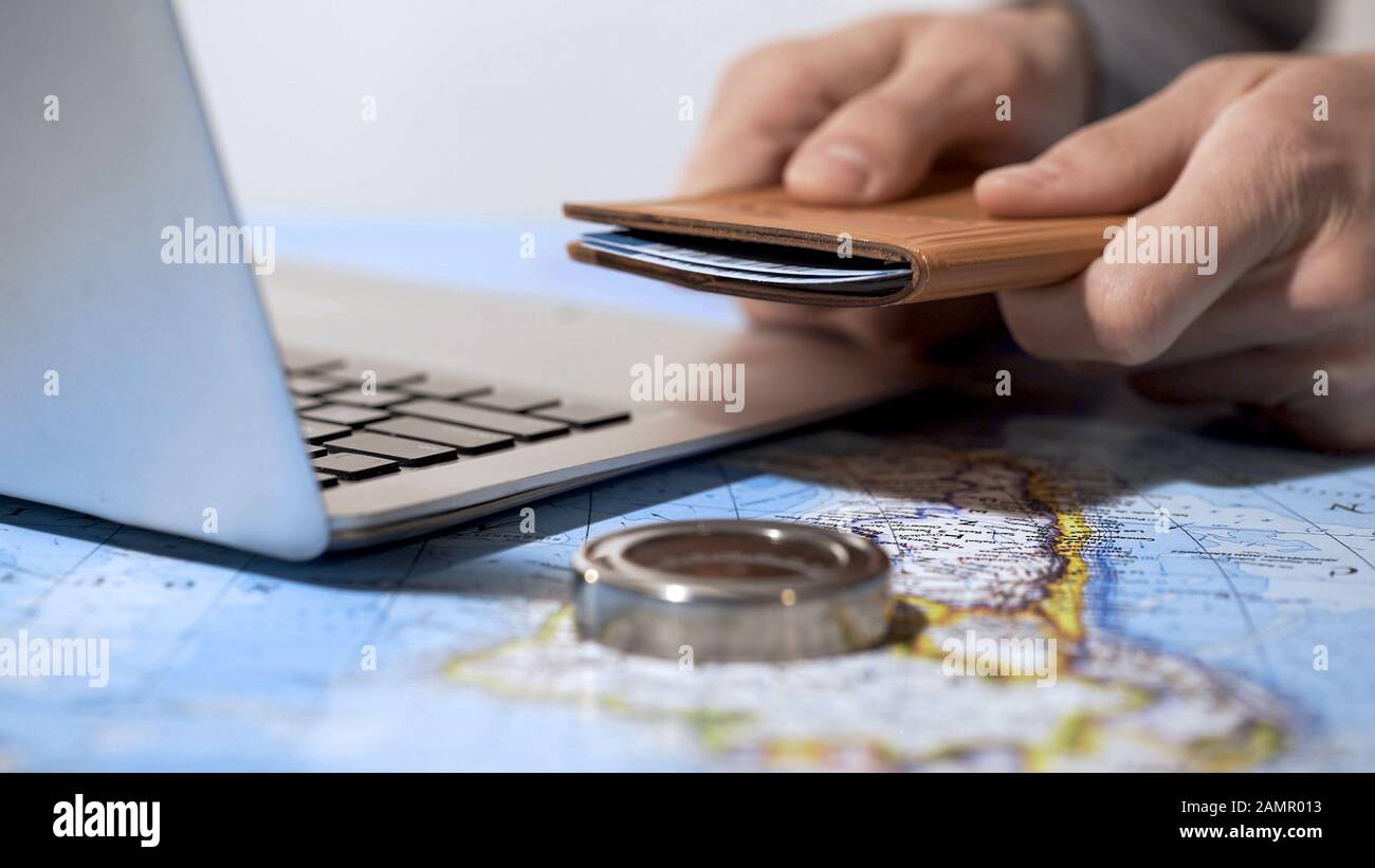 Planning vacation laptop map hi-res stock photography and images - Alamy